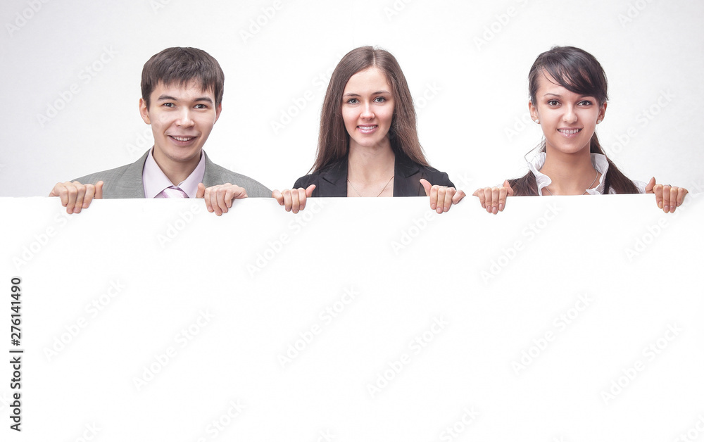 successful business team holding a blank banner. successful business team holding a blank banner.