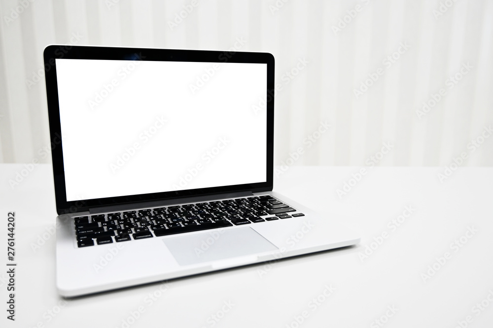 blank screen Modern laptop computer on table in office,Copy space blank screen Modern laptop computer on table in office,Copy space