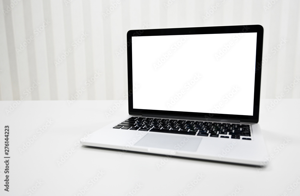 blank screen Modern laptop computer on table in office,Copy space blank screen Modern laptop computer on table in office,Copy space