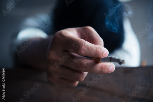 Asian Stress man smoking,Thailand people,No tobacco day concept,DIe from smoke smoking cigarette