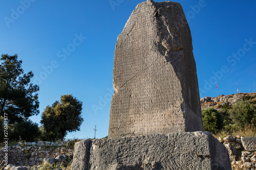 Xanthos Ancient City. Grave monument and the ruins of ancient city of Xanthos - Letoon (Xantos, Xhantos, Xanths) in Kas, Antalya/Turkey. Capital of Lycia. photo