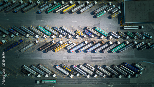 Aerial top view automotive fuel tankers shipping fuel, Tanker truck parking aerial view.
