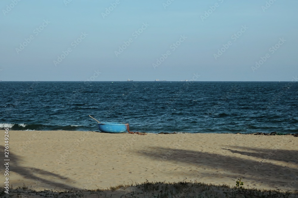 pier and basket boats in asian fishing village