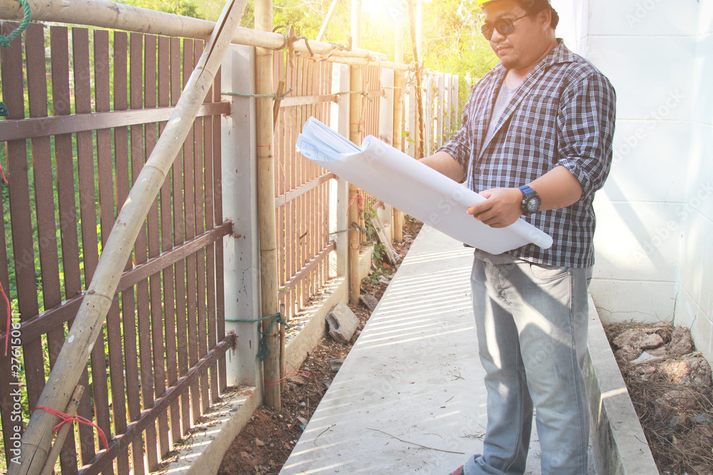 Engineers are supervising construction workers.concept Architects Engineers are supervising construction workers.concept Architects