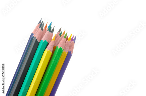 Many color pencils on white isolated background. close-up. stationery.