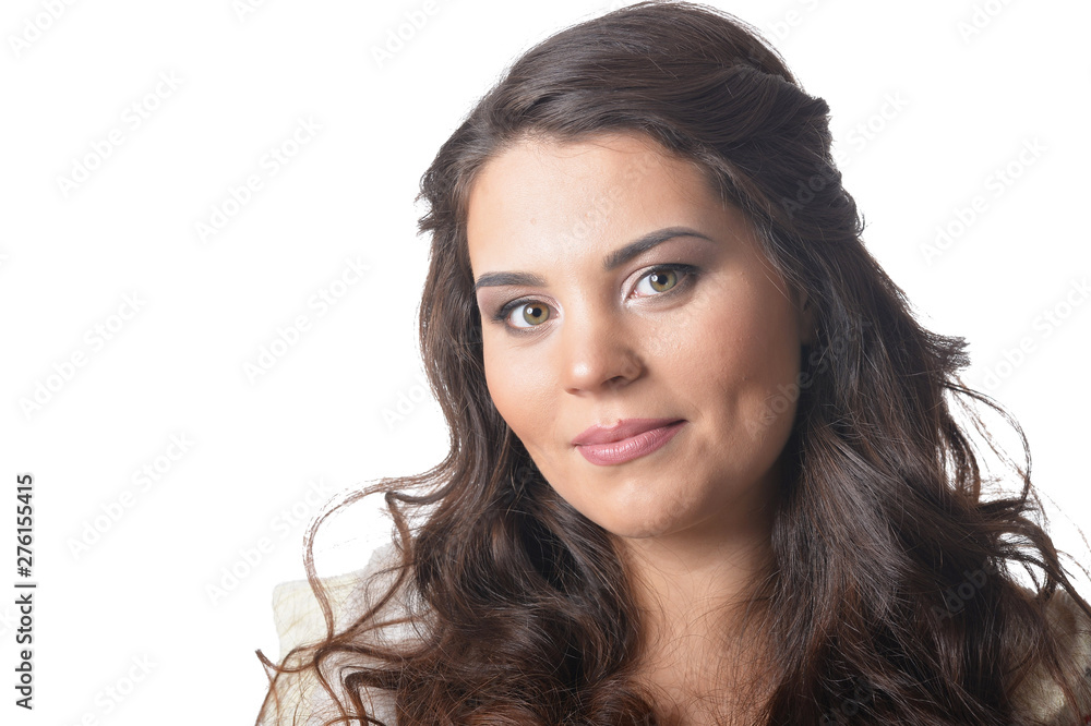 Portrait of exited young woman with dark lond hair on white background Portrait of exited young woman with dark lond hair on white background