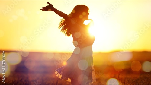 Young woman on sunset light