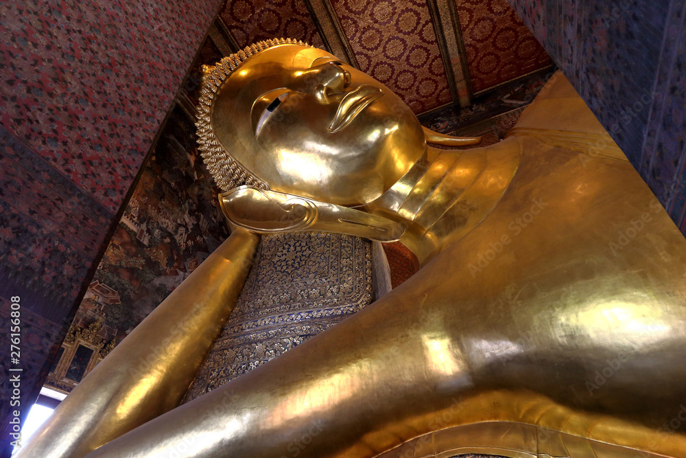 Large reclining Buddha at Wat Pho temple in Bangkok, Thailand on June 15, 2019.