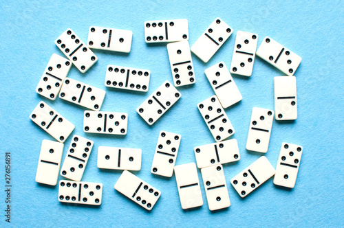 White domino pieces on a blue background.
