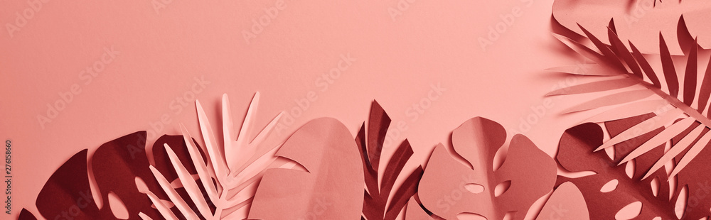 top view of exotic paper cut palm leaves on pink background with copy space, panoramic shot - obrazy, fototapety, plakaty 