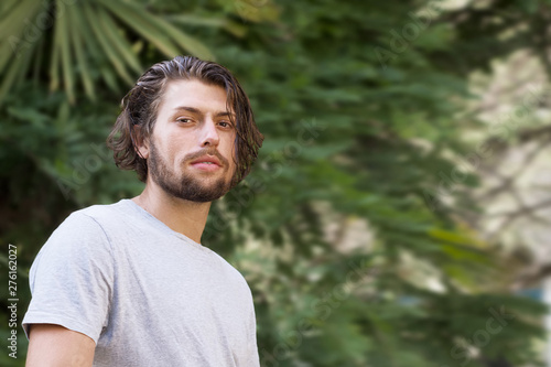 Portrait of a modern young man with a beard