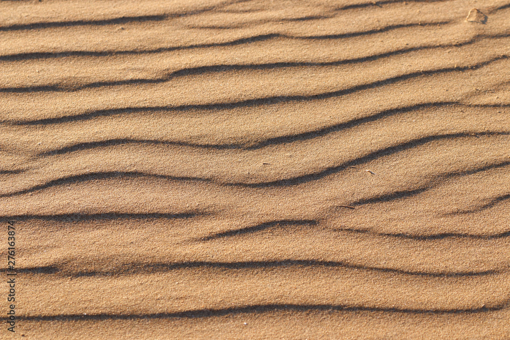 Wave texture background on the sand beach Wave texture background on the sand beach