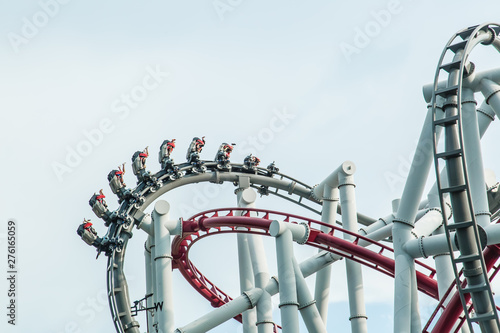people enjoy Roller coaster on sky background view