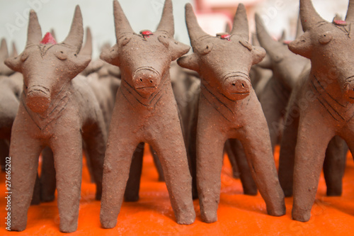 Bullocks made with mud clay, made during the festival at the start of the Monsoon in North Karnataka. photo