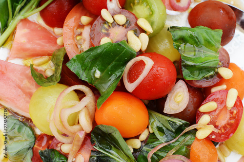 Wall Mural Detail of colourful fresh tomato salad