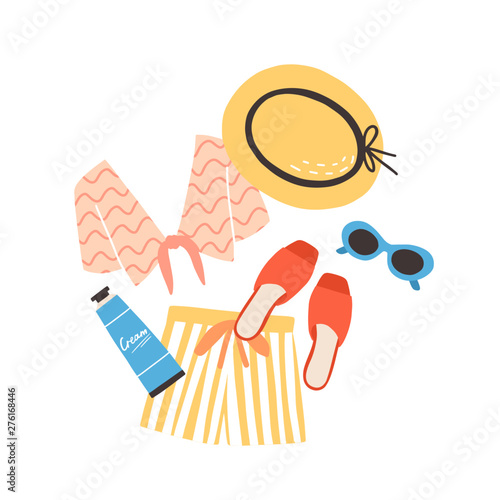 Modern summer composition with beachwear, sunglasses and sunscreen