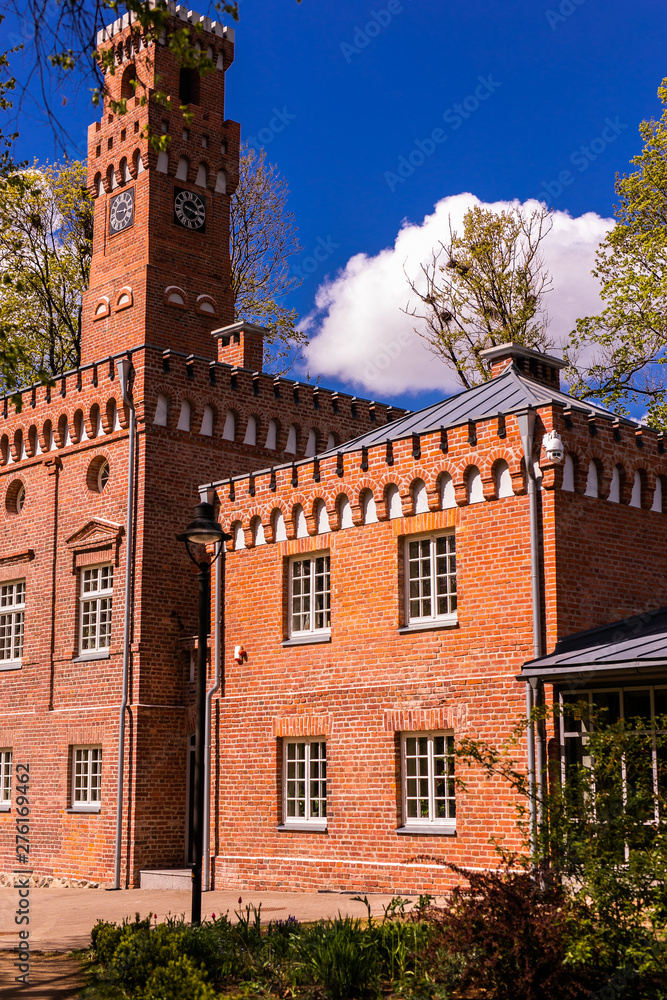 Obraz premium Manor house, palace with park of Duke Oginskis in Plunge, Lithuania. Plungė manor homestead in neo-renaissance style.