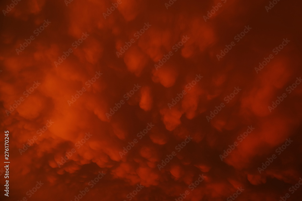 Mammatus clouds forming at sunset ahead of severe thunderstorm Mammatus clouds forming at sunset ahead of severe thunderstorm