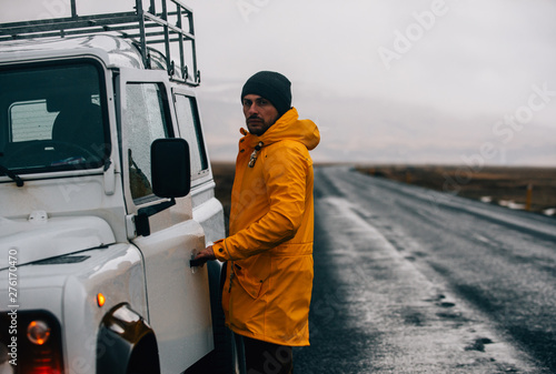 Explorer on the icelandic tour, traveling across iceland discovering natural destinations photo