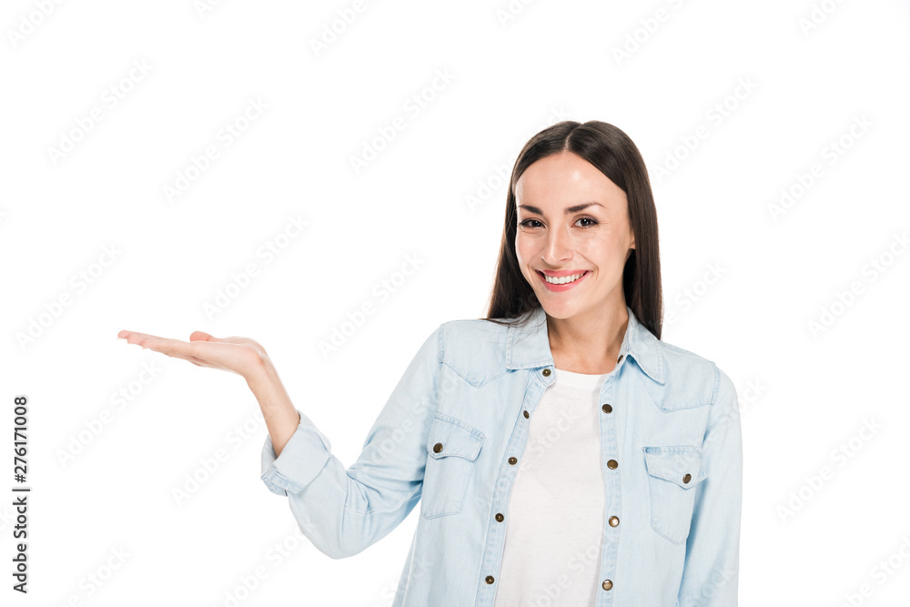 happy brunette woman pointing with hand isolated on white happy brunette woman pointing with hand isolated on white