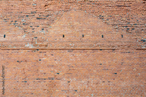 Old damaged worn brick wall background