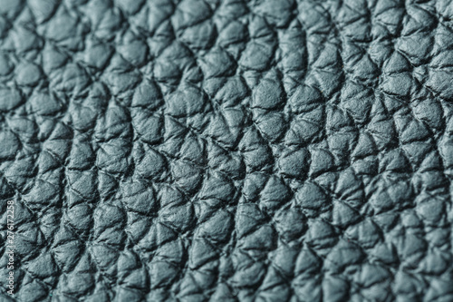 Green textured leather closeup. Full frame, close up