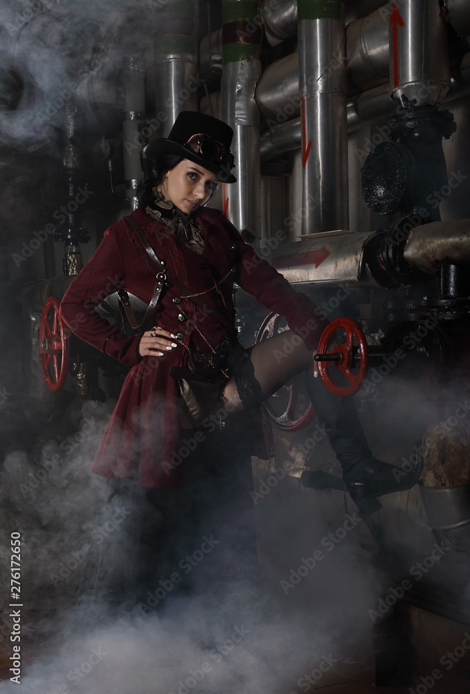 Sexy steampunk woman over industrial background Sexy steampunk woman over industrial background