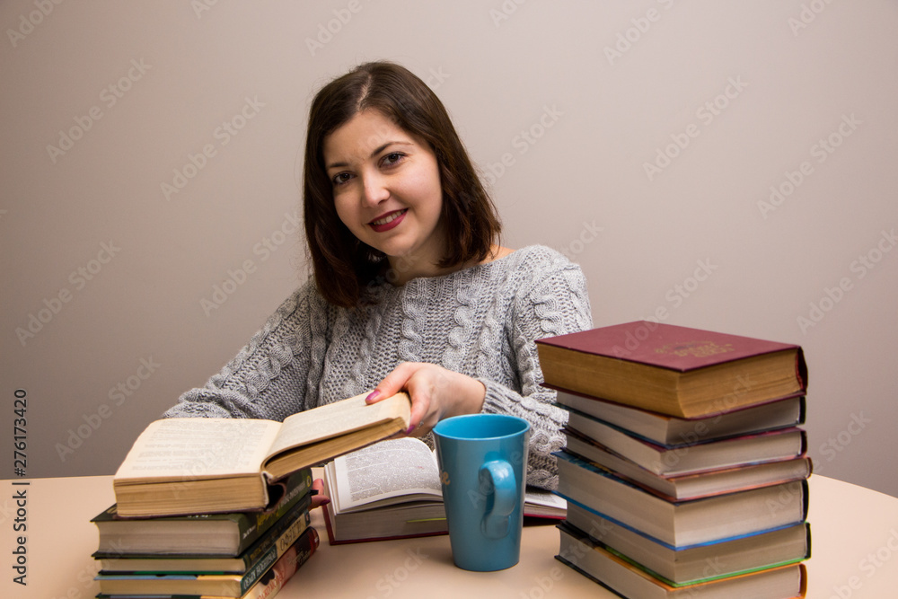 Student girl with stack of books Student girl with stack of books