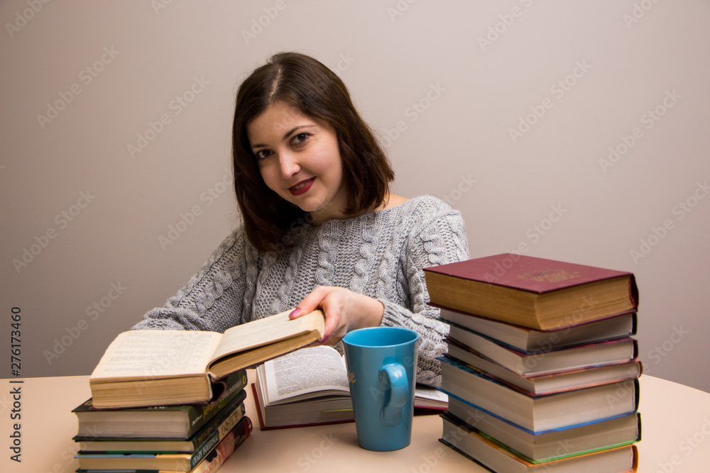 Student girl with stack of books Student girl with stack of books