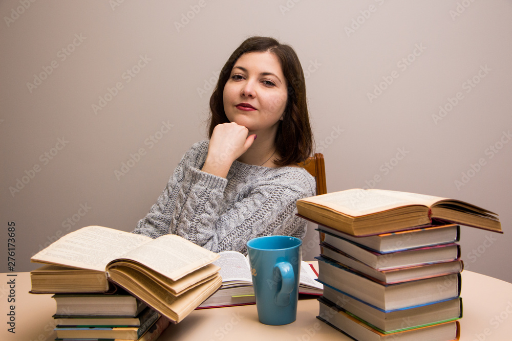 Student girl with stack of books Student girl with stack of books
