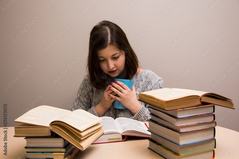Student girl with stack of books Student girl with stack of books