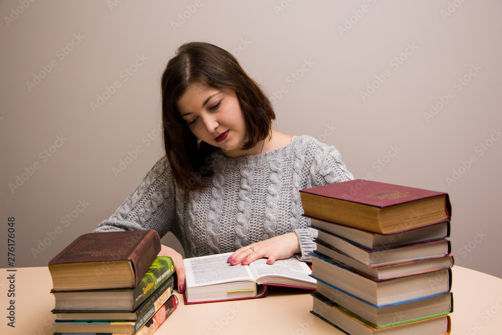 Student girl with stack of books Student girl with stack of books