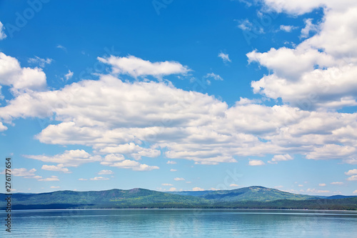Fototapeta Naklejka Na Ścianę i Meble -  scenic mountain lake with sky and clouds. nature background.