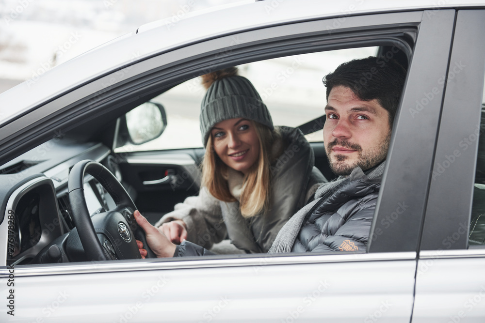 Ready for a journey. Nice couple have weekend at countryside at winter time Ready for a journey. Nice couple have weekend at countryside at winter time