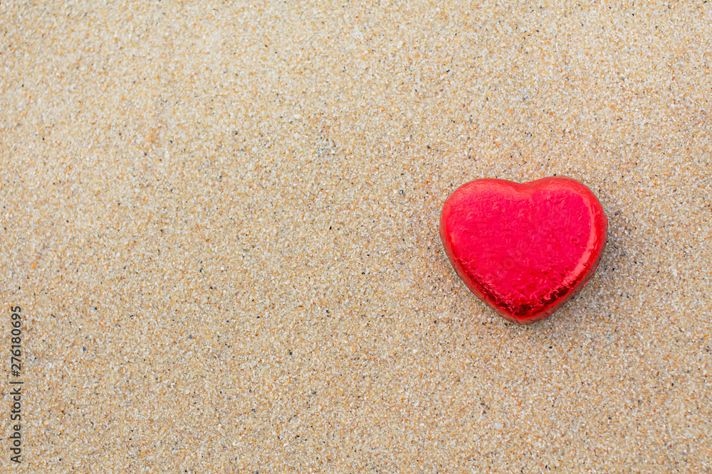 Chocolate color Lovely red heart on the beach. Background is a natural in real place, creative Valentine's Day Concept, tropical style background made in Phuket, Thailand. Chocolate color Lovely red heart on the beach. Background is a natural in real place, creative Valentine's Day Concept, tropical style background made in Phuket, Thailand.