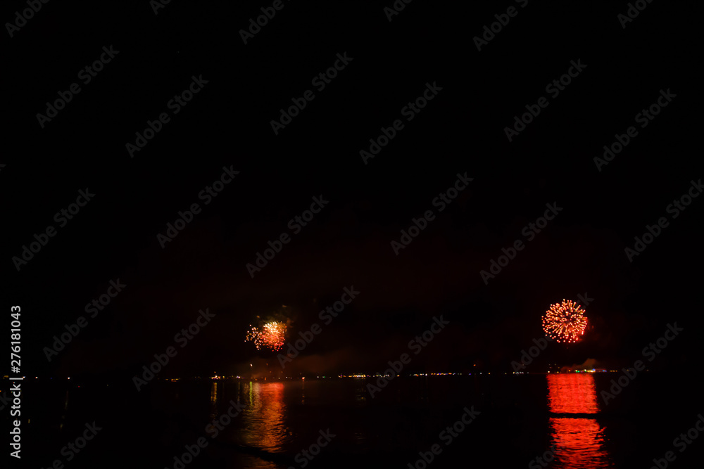 firework on black background for celebration party on the beach. at phuket thailand merry christmas and happy new year.