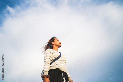 A woman looking to the sky.