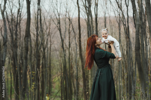 Mom and baby rejoice in the woods