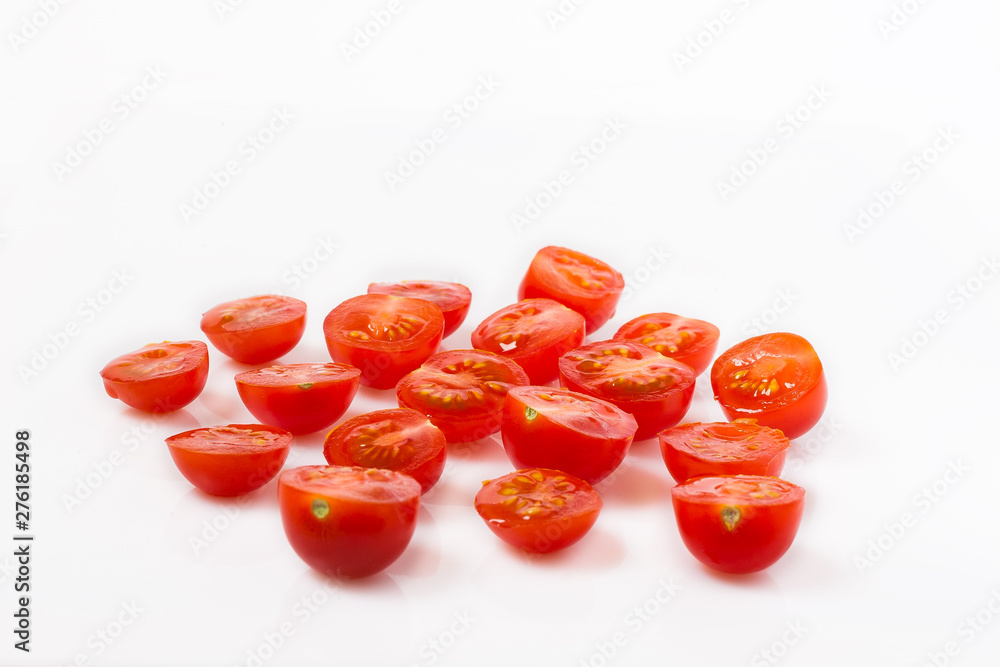 lots of cherry tomatoes cut into halves lots of cherry tomatoes cut into halves
