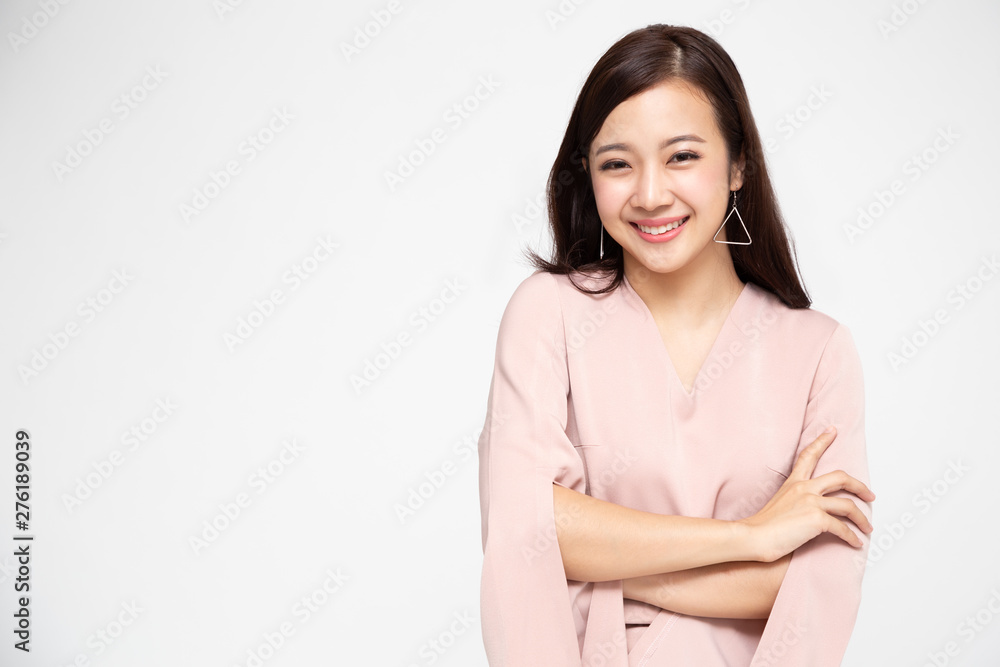 Portrait of successful business asian women in pink dress with arms crossed and smile isolated over white background, Young businesswoman smiling and looking at camera, Happy feeling concept Portrait of successful business asian women in pink dress with arms crossed and smile isolated over white background, Young businesswoman smiling and looking at camera, Happy feeling concept