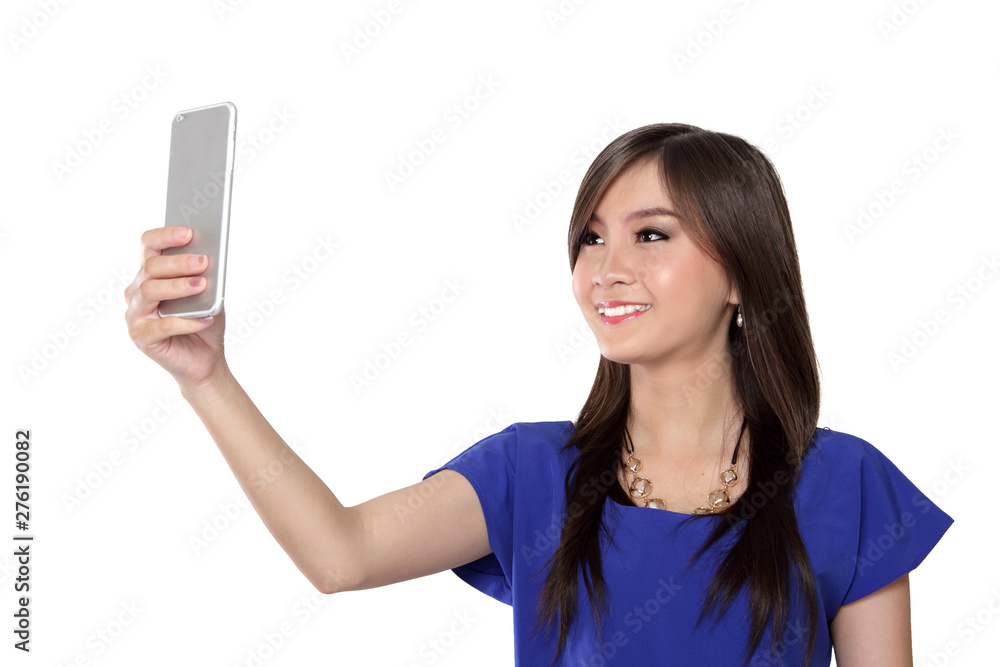 Beautiful Asian girl with one hand holding her mobile phone and using it for video call, isolated on white background Beautiful Asian girl with one hand holding her mobile phone and using it for video call, isolated on white background