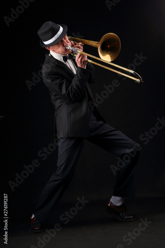 Photography Growth portrait of an elderly musician with a trombone