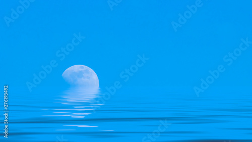 Moon over the blue wide sea