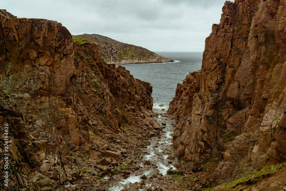 Rocky gorge on the shore of the Barents Sea