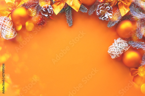 Christmas composition.  Background  orange colors with decorations. 