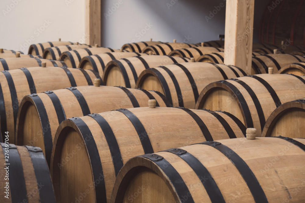 Oak barrels in the cellar filled with brandy