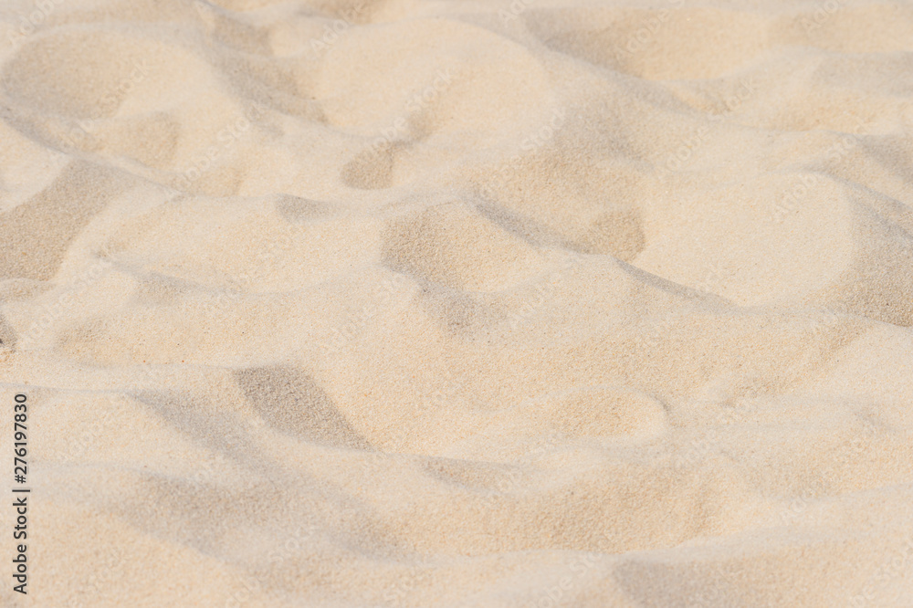closeup of sand pattern of a beach in the summer closeup of sand pattern of a beach in the summer
