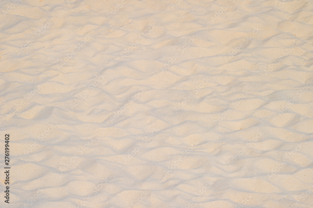 closeup of sand pattern of a beach in the summer closeup of sand pattern of a beach in the summer