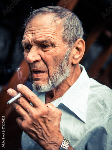 Old Man Smoking portrait