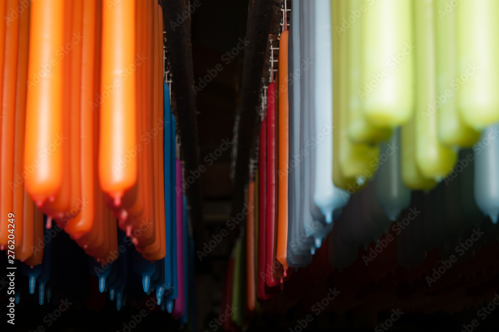 Fototapeta premium Colored candles in production